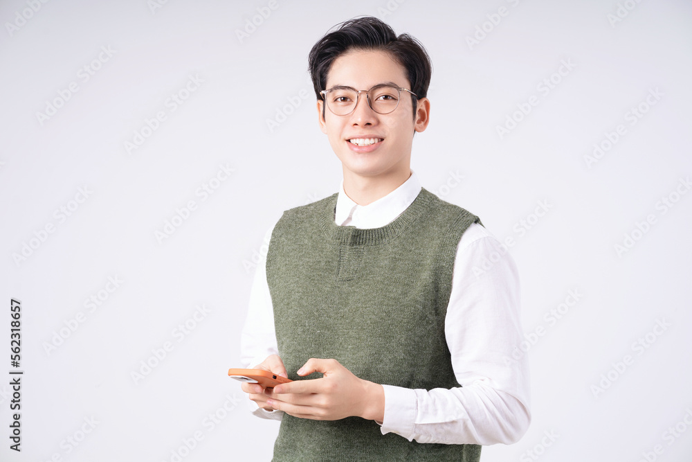 Image of young Asian man on white background Image of young Asian man on white background