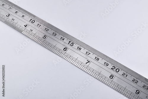 Iron Ruler isolated white background. Unit is Centimeters and inch.