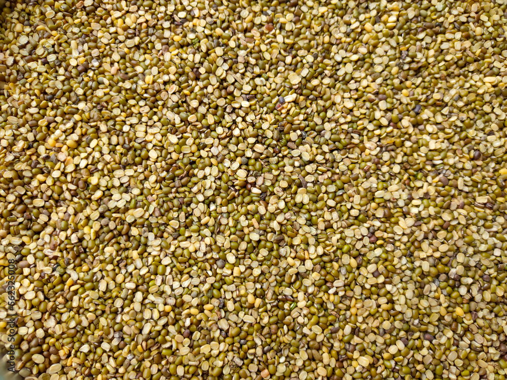 Green and yellow dry split mung beans. Selective focus Green and yellow dry split mung beans. Selective focus