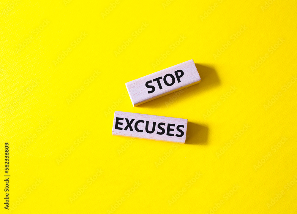 Stop excuses symbol. Concept words Stop excuses on wooden blocks. Beautiful yellow background. Business and Stop excuses concept. Copy space. Stop excuses symbol. Concept words Stop excuses on wooden blocks. Beautiful yellow background. Business and Stop excuses concept. Copy space.