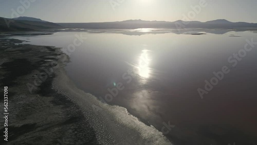 Sun Reflects on Laguna Colorada, Bolivia, Altiplano High Land, Borax Islands, Salt Flat, Travel and Tourism Destination in South America photo