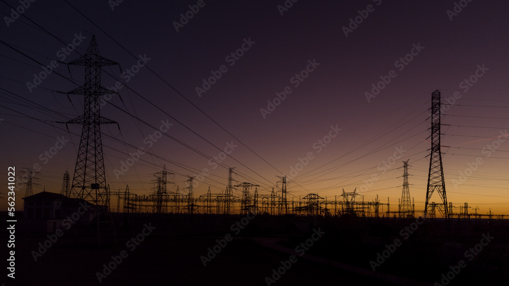 Electric substation at sunset