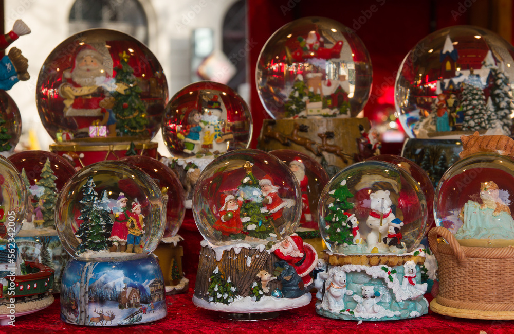Close up of christmas snow globes at the christkindlmarkt of Brunico in Alto Adige, Italy