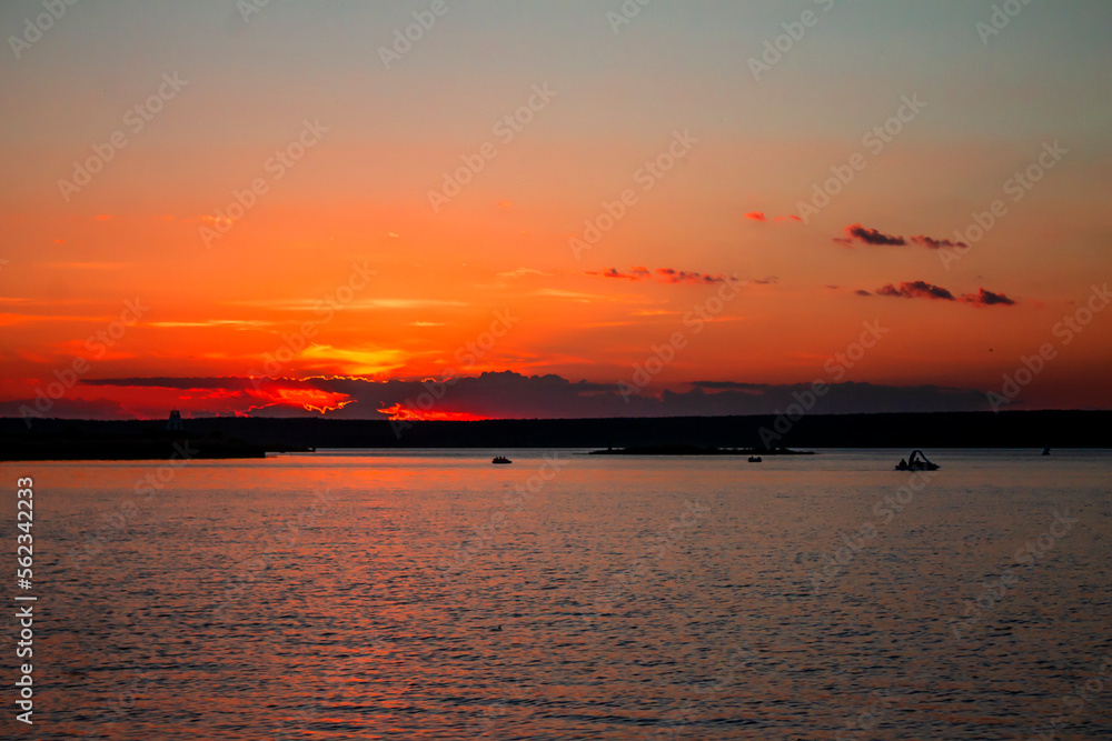 Sunset on the river, lake in artistic processing Sunset on the river, lake in artistic processing