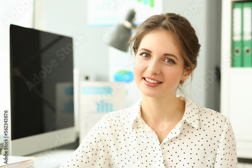 Portrait of beautiful young smiling business woman