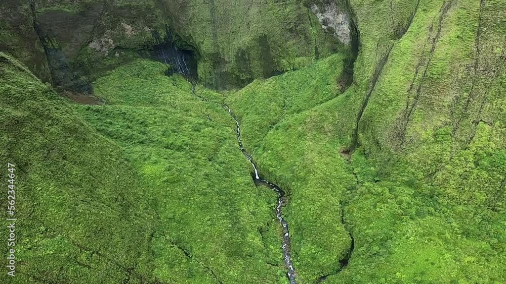 Aerial View of River in Rolling Hills and Green Landscape in Kauai Hawaii