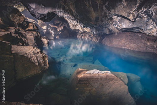 Grjótagjá, una grotta suggestiva Islandese con al suo interno una pozza di acqua termale. Famosa per essere uno scenario del trono di spade. photo