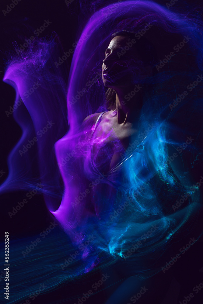 portrait cyber futuristic elegant lady in a silver swimsuit vogue look isolated vibrant gradient colorful effect background. Woman is in a multicolored aura. portrait cyber futuristic elegant lady in a silver swimsuit vogue look isolated vibrant gradient colorful effect background. Woman is in a multicolored aura.