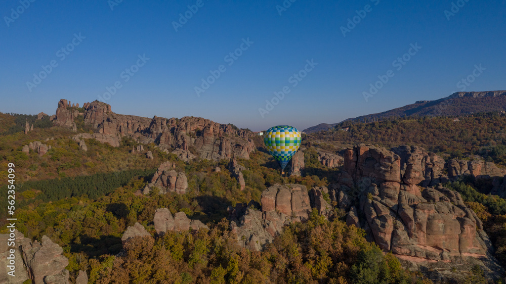 Aerial view of hot air balloon at Belogradchik rocks in the autumn, November 2019