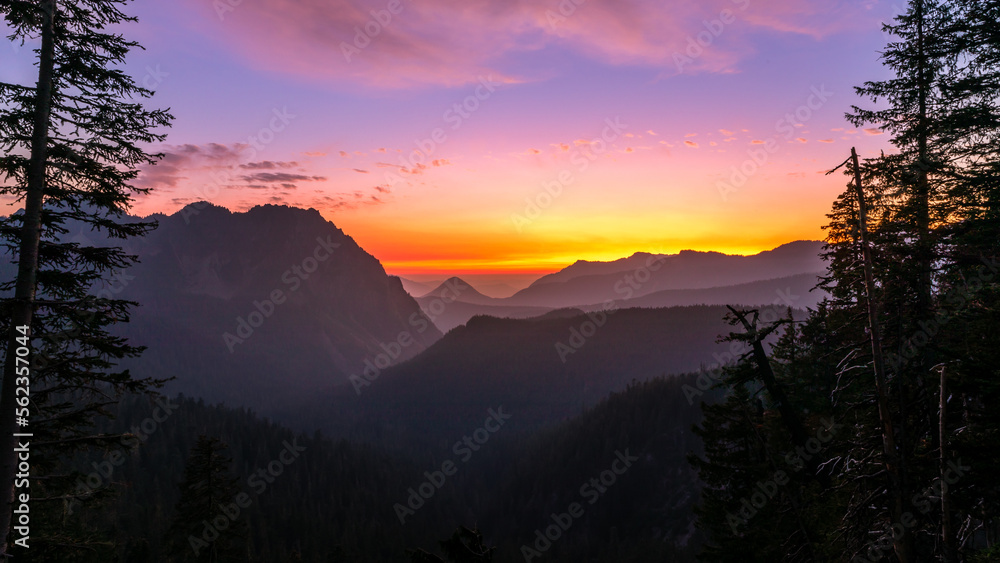 Purple sunset at Sunset Inspiration Point overlooking Mount Rainier National Park in Washington