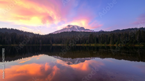 Mt Rainier reflected in Reflection Lake at purple sunset in Washington's Mount Rainier National Park