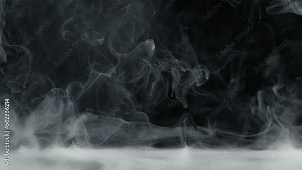 Super Slow Motion Shot of Abstract Flowing Smoke Isolated on Black at 1000fps. Super Slow Motion Shot of Abstract Flowing Smoke Isolated on Black at 1000fps.