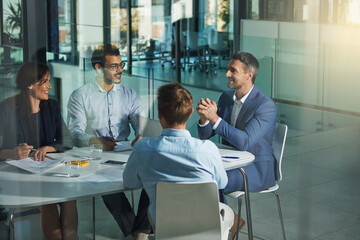 Business people, meeting and discussion for corporate planning, strategy or brainstorming at the office. Group of employee workers in business meeting, team planning or collaboration at the workplace