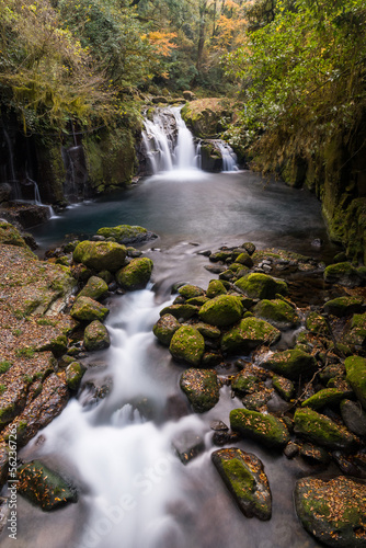waterfall in autumn forest