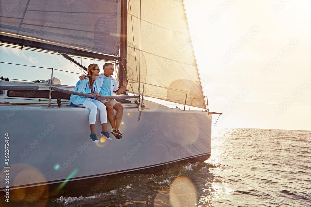 Holiday, relax and couple on a yacht in the ocean for adventure, freedom and sailing trip. Travel, summer and mature man and woman on a boat in the sea for a romantic seaside vacation in Greece. - obrazy, fototapety, plakaty 