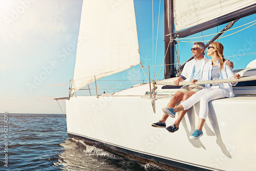 Relax, travel and luxury with couple on yacht for summer, love and sunset on Rome vacation trip. Adventure, journey and ship with man and woman sailing on boat for ocean and tropical honeymoon at sea © Reese/peopleimages.com