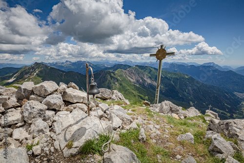 Beautiful nature. Cross on the top of the mountain. Mountain hiking Trail Road. Italy Lago Avostanis Casera Pramosio Alta
