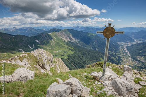 Beautiful nature. Mountain hiking Trail Road. Cross on the top of mountain. Italy Lago Avostanis Casera Pramosio Alta