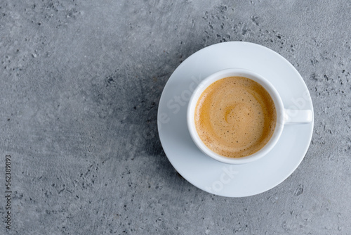 Espresso cup on grey background