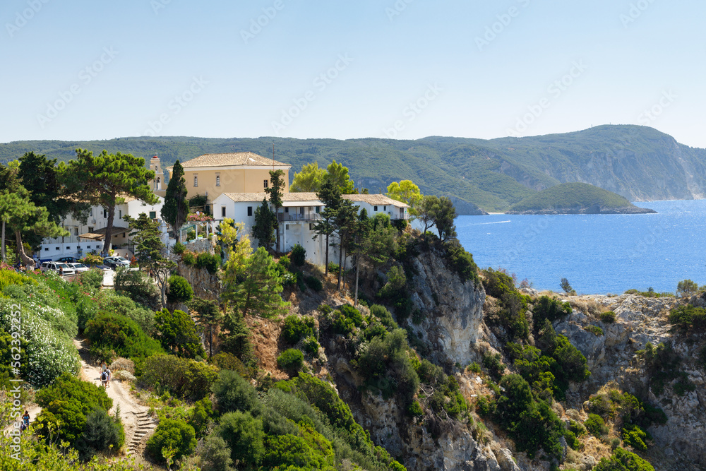 Landscape of picturesque Paleokastritsa monastery in Corfu, Greece. Monastery of Holy Theotokos, 1225r