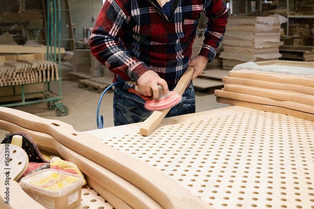 A carpenter works in his workshop.