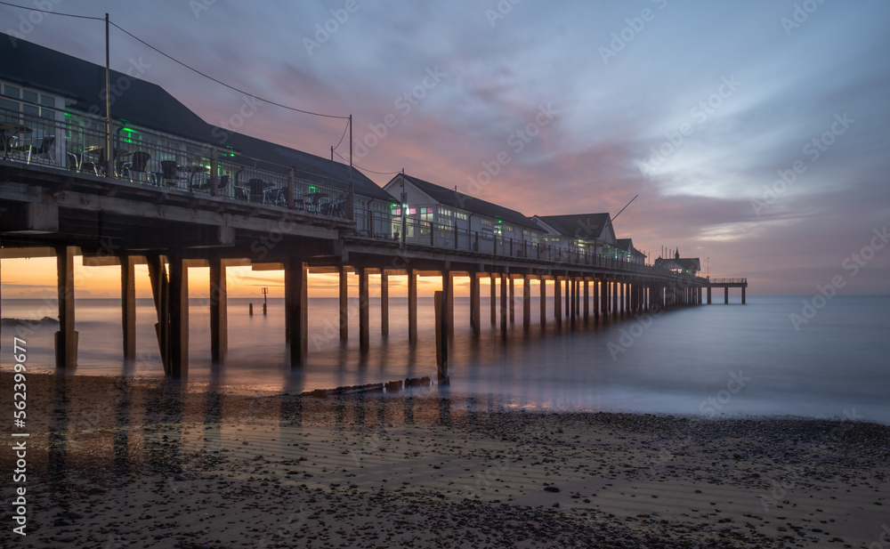 Southwold Pier on the Suffolk coast from the southside with a colourful sunrise sky sunrise