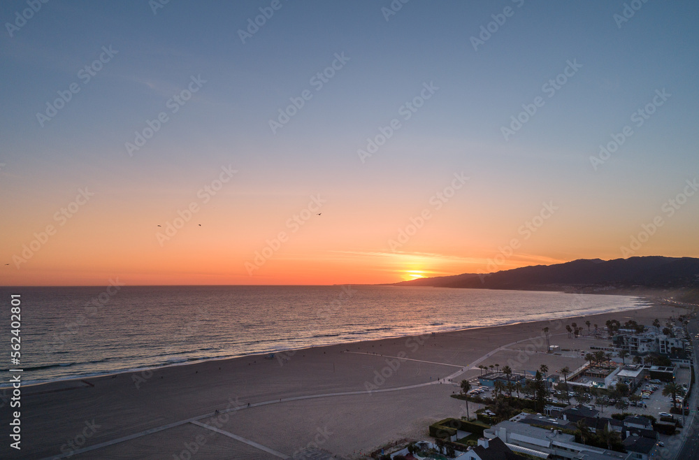 Sunset in Santa Monica, Los Angeles, California. Situated on Santa Monica Bay, it is bordered on three sides by the city of Los Angeles – Pacific Palisades, Brentwood, West Los Angeles.