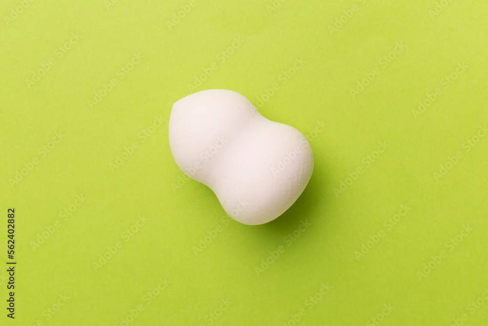 Beauty blender on color background, top view Beauty blender on color background, top view