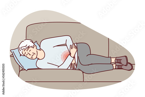 Elderly human is experiencing pain in stomachs and weakness after food poisoning lies on couch with sad face. Gray-haired man holding on to belly suffers from digestive disorders. Flat vector design 