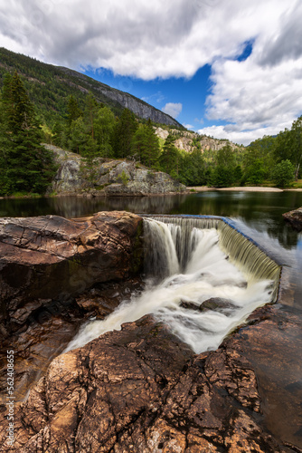 Small waterfall on the river in the beautiful place in Norway