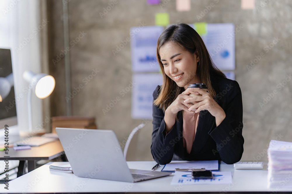 Asian businesswoman working with calculator to analyze business data and financial concept Female accountant working with computer and for business and financial expenses charming asian girl Asian businesswoman working with calculator to analyze business data and financial concept Female accountant working with computer and for business and financial expenses charming asian girl