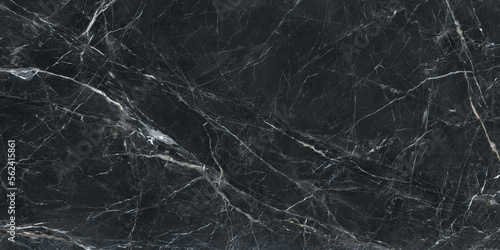 Black marble stone background with white vein patterns and shades. Glossy marble slab granite with colours, shapes and patterns. Marble is used for the flooring, bathroom, ceramic tile, wallpaper.