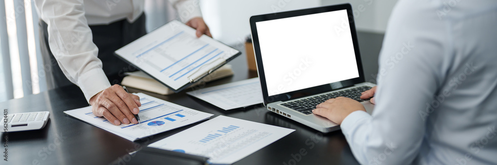 Financial inspector calculating a numbers in office room.. Financial inspector calculating a numbers in office room..