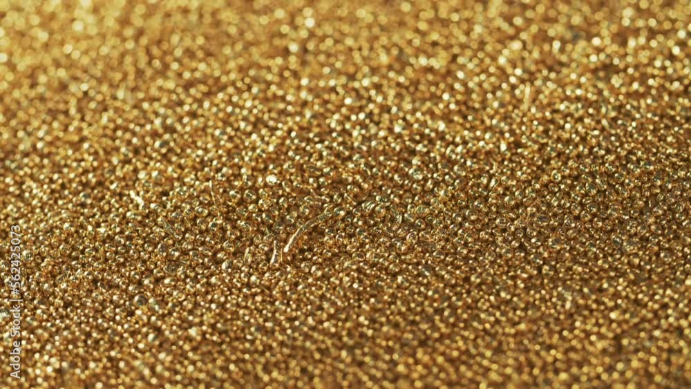 This video shows gold pellets. This video will decorate your projects related to precious metals, gold. This video shows gold pellets. This video will decorate your projects related to precious metals, gold.