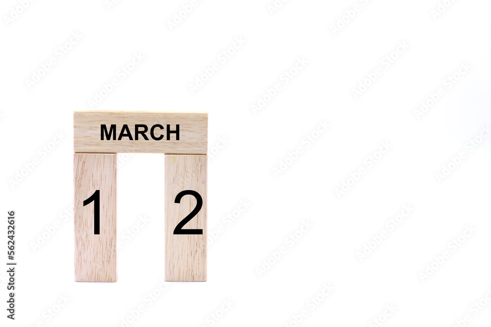 March 12 displayed wooden letter blocks on white background with space for print. Concept for calendar, reminder, date. March 12 displayed wooden letter blocks on white background with space for print. Concept for calendar, reminder, date.