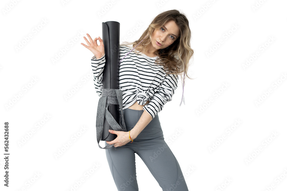 A fitness athlete holds a mat on a transparent background. A fitness athlete holds a mat on a transparent background.