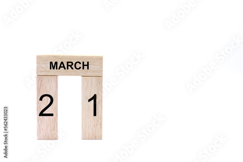 March 21 displayed wooden letter blocks on white background with space for print. Concept for calendar, reminder, date. 