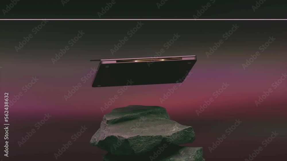A flying laptop rotates over a pile of rocks. Pink dark color. Opens ...