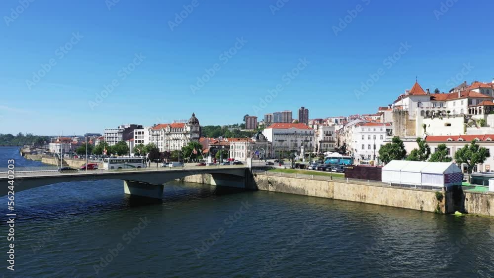 The Mondego River in Coimbra , Europe, Portugal, Center, in summer on a sunny day. The Mondego River in Coimbra , Europe, Portugal, Center, in summer on a sunny day.