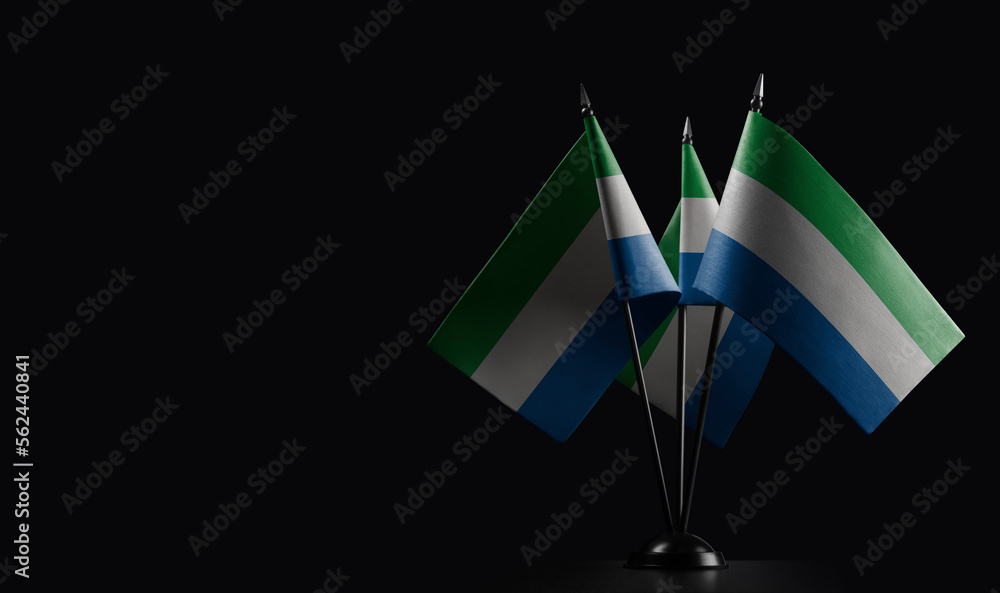 Small national flags of the Sierra Leone on a black background Stock ...