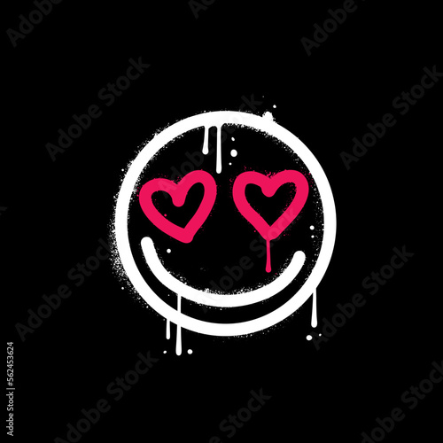 Emoji smiling face wiwh heart shaped eyes. Urban typography street art print with spray effect and smile icon for graphic tee t shirt or sweatshirt. Hand drawn Textured Vector photo