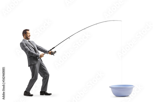 Full length profile shot of a businessman fishing in a wash basin