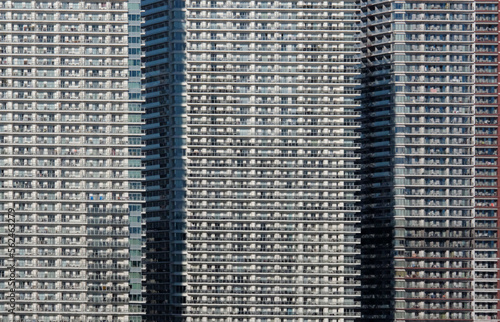 Photography Dense urban living in a row of skyscrapers in Tokyo, Japan