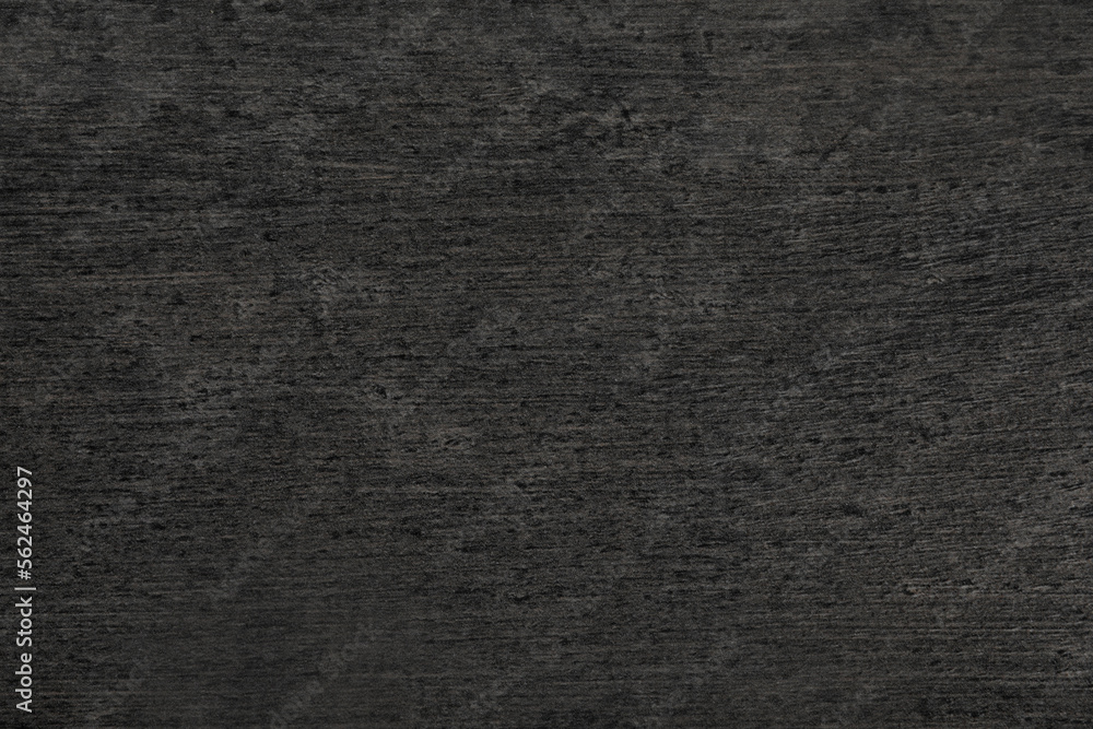 Fototapeta premium Texture of black stone surface as background, closeup
