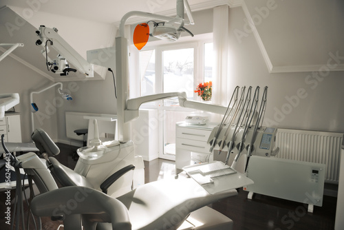 Concept of dental. stomatology concept - interior of new modern dental clinic office with chair.. Dental equipment