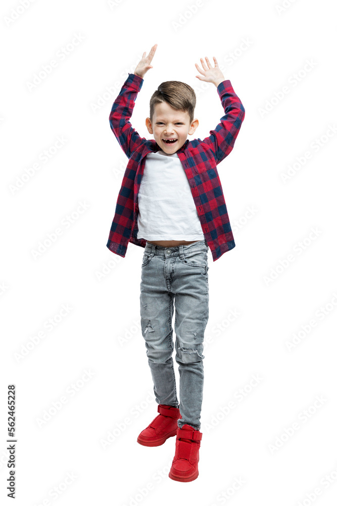 A cute joyfully screaming and laughing boy 5-6 years old in jeans, a white T-shirt and a red plaid shirt. Optimism and positivity. Full height. Isolated on white background. Vertical. A cute joyfully screaming and laughing boy 5-6 years old in jeans, a white T-shirt and a red plaid shirt. Optimism and positivity. Full height. Isolated on white background. Vertical.