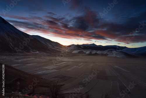 Blue hour waiting for the sunrise of a winter morning in Castelluccio di Norcia  Umbria  Italy