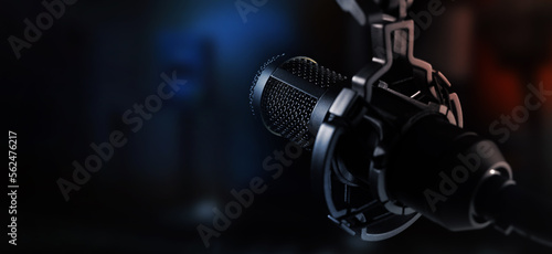 podcast sound recording microphone in home studio with neon lights. banner with copy space