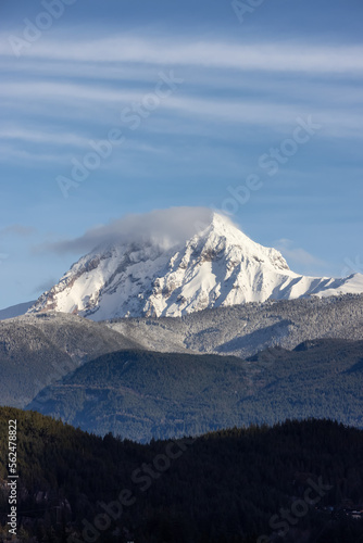 Garibaldi Mountain covered in snow and clouds. Canadian Nature Landscape Background. Winter Season in Squamish, British Columbia, Canada. © edb3_16