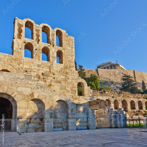 The entrance and arches of the ancient conservatory of Herod Atticus at the foot of the Acropolis. Cultural travel in Athens, Greece.